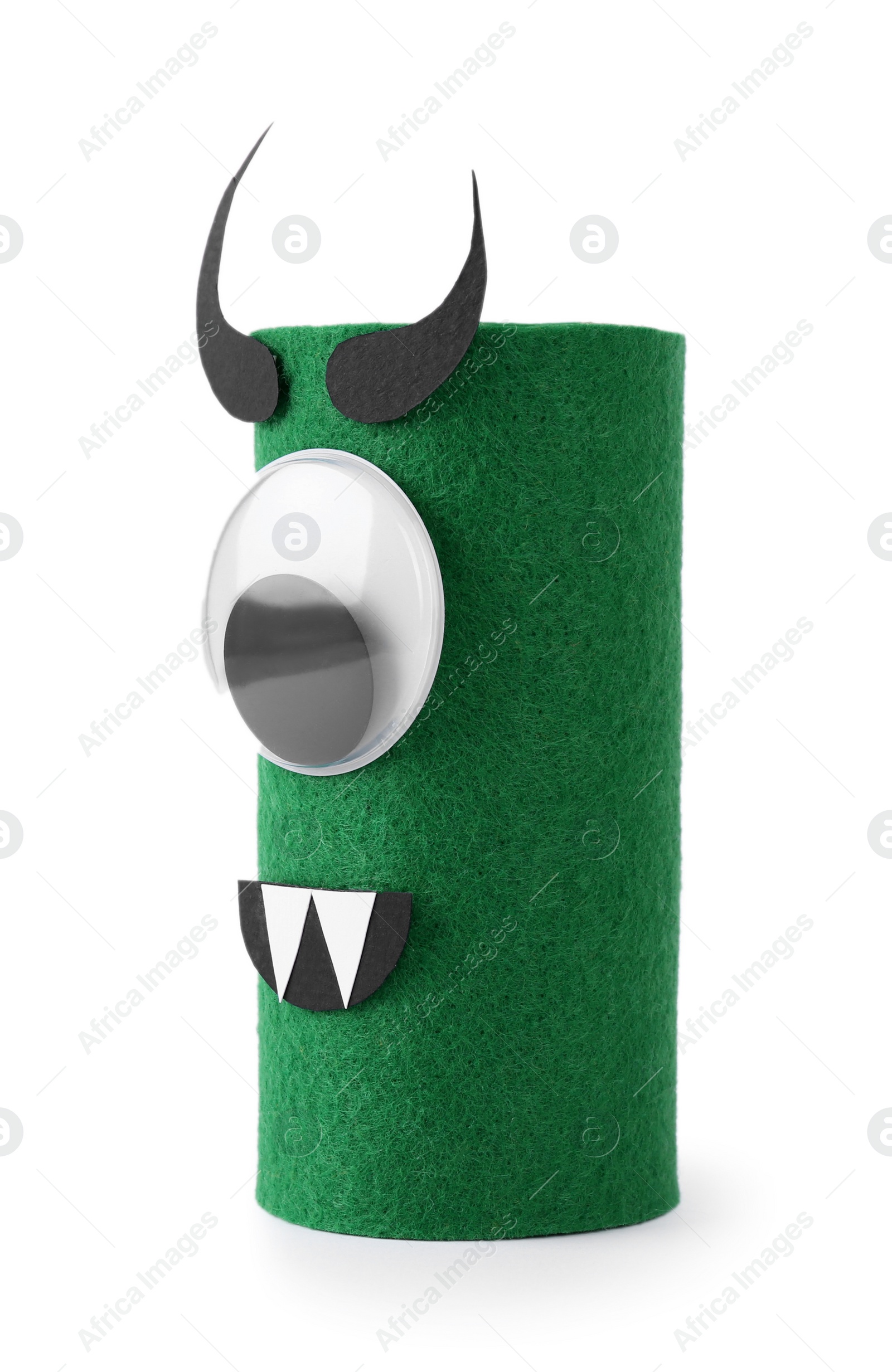 Photo of Monster made of green felt isolated on white. Halloween decoration