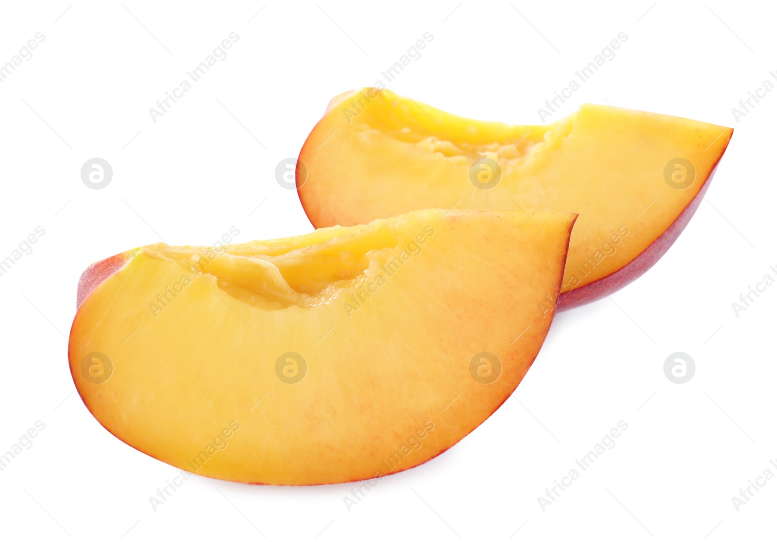 Photo of Slices of sweet juicy peach on white background