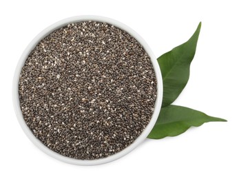 Photo of Chia seeds in bowl with leaves on white background, top view