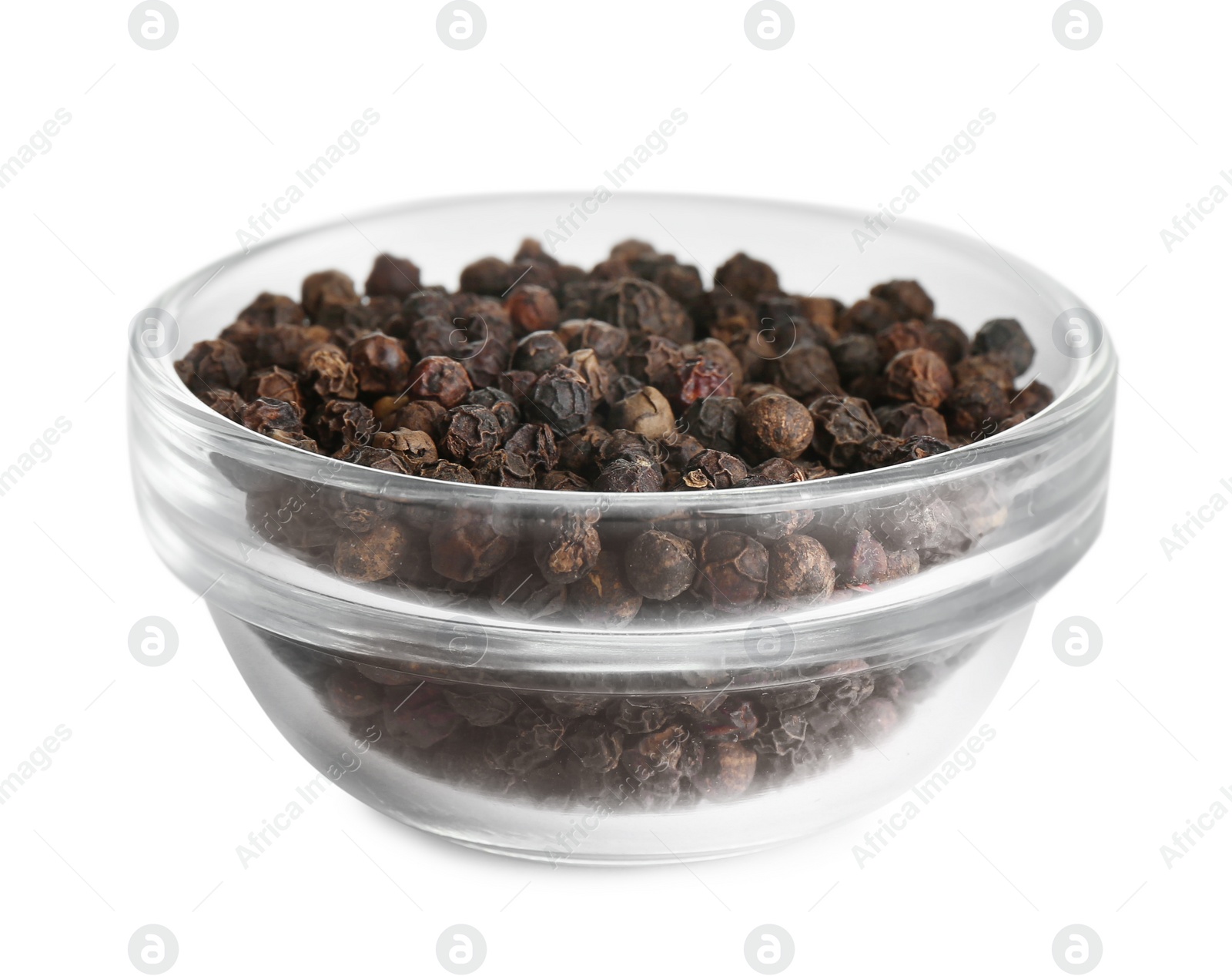 Photo of Bowl of black peppercorns isolated on white