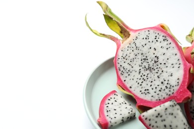 Photo of Delicious sliced dragon fruit (pitahaya) on white background, closeup