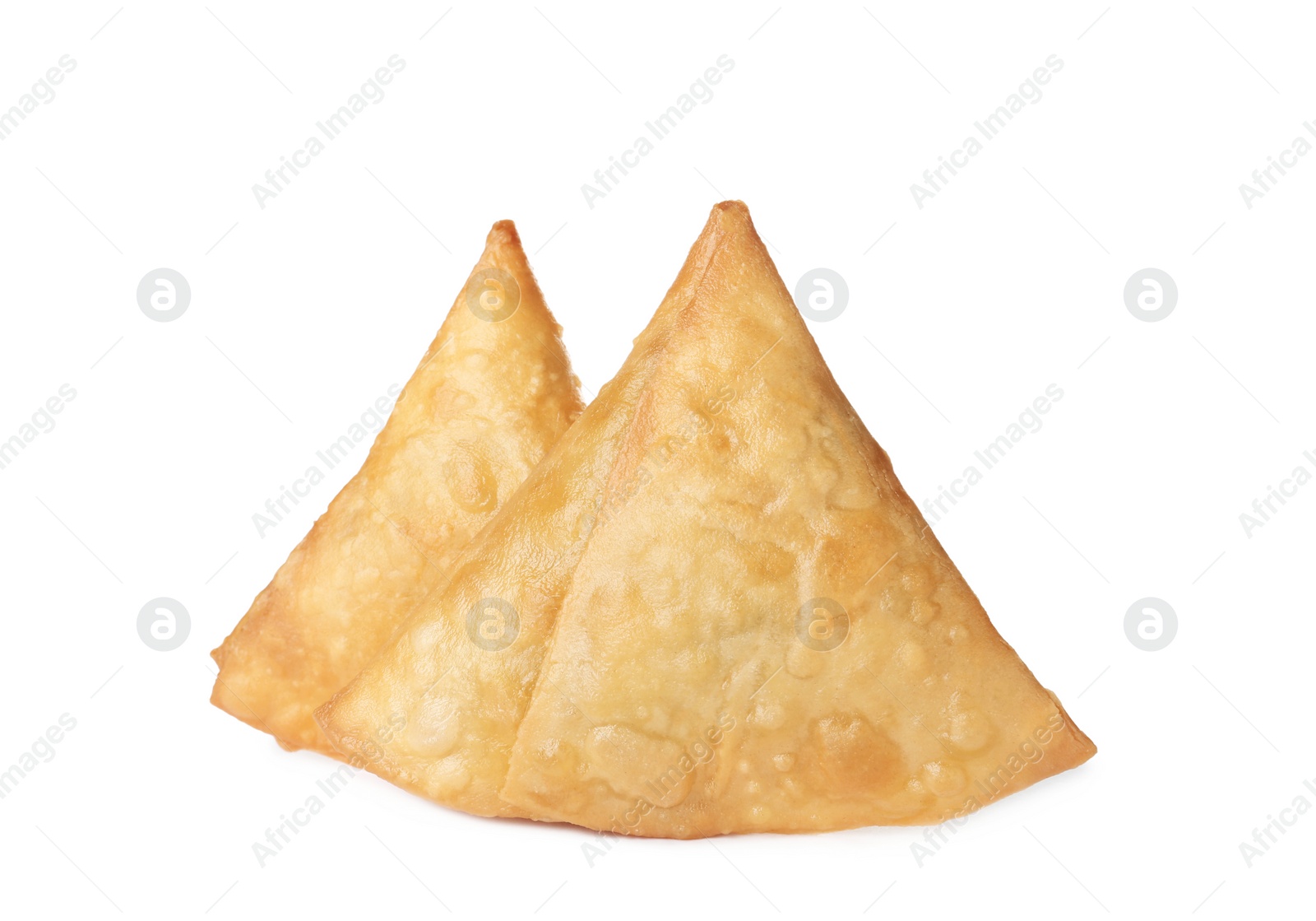 Photo of Fresh delicious crispy samosas on white background