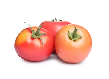 Delicious fresh ripe tomatoes on white background