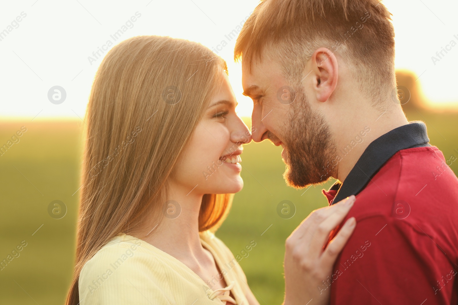 Photo of Happy young couple outdoors on sunny spring day