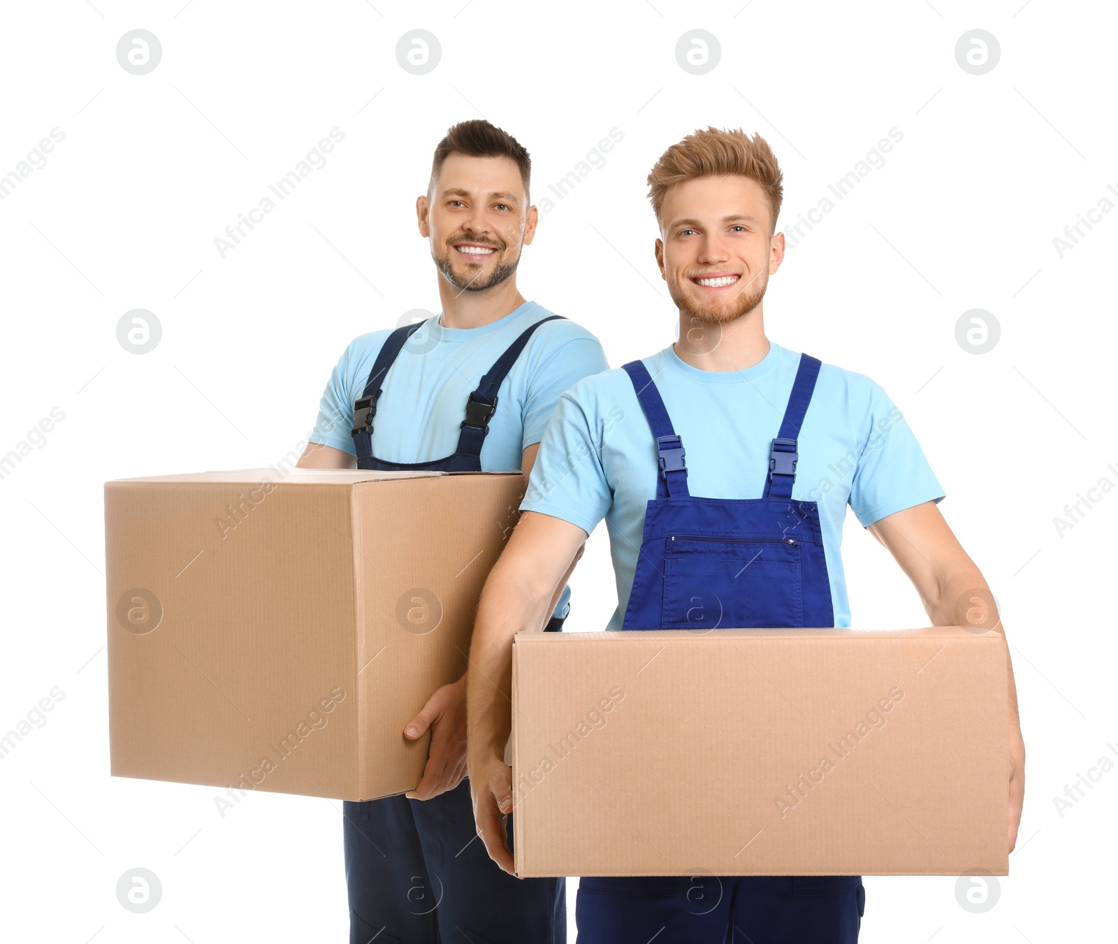 Photo of Portrait of moving service employees with cardboard boxes on white background