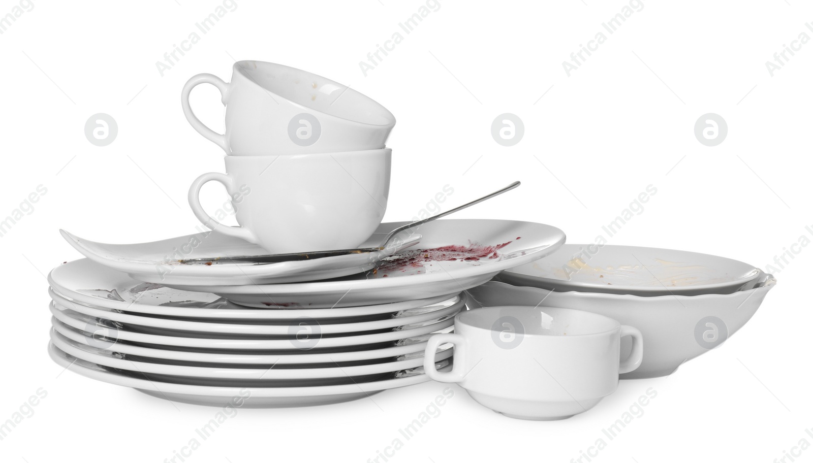 Photo of Set of dirty dishes isolated on white