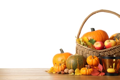 Photo of Composition with ripe pumpkins and autumn leaves on wooden table against white background. Happy Thanksgiving day