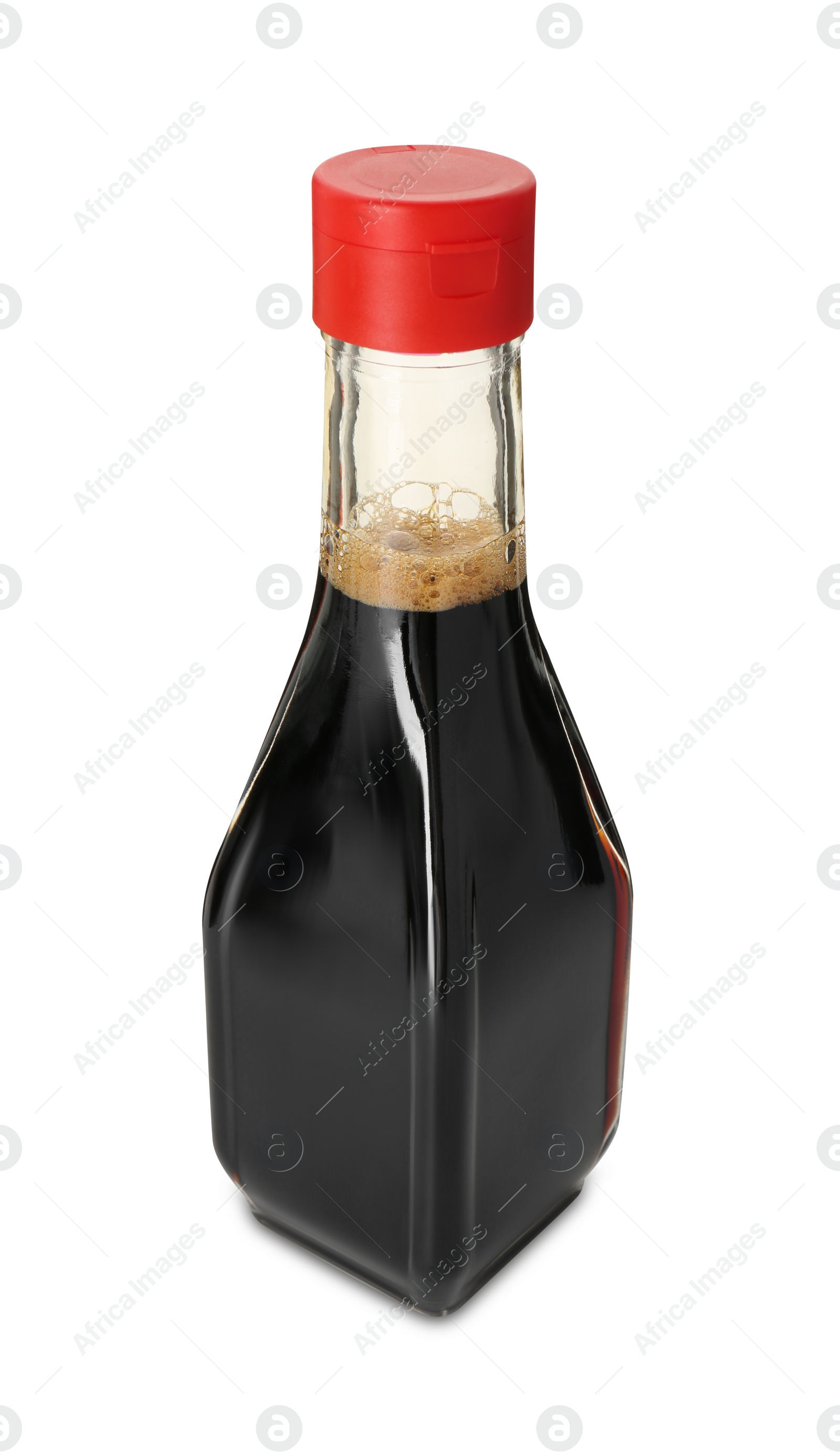 Photo of Tasty soy sauce in bottle isolated on white