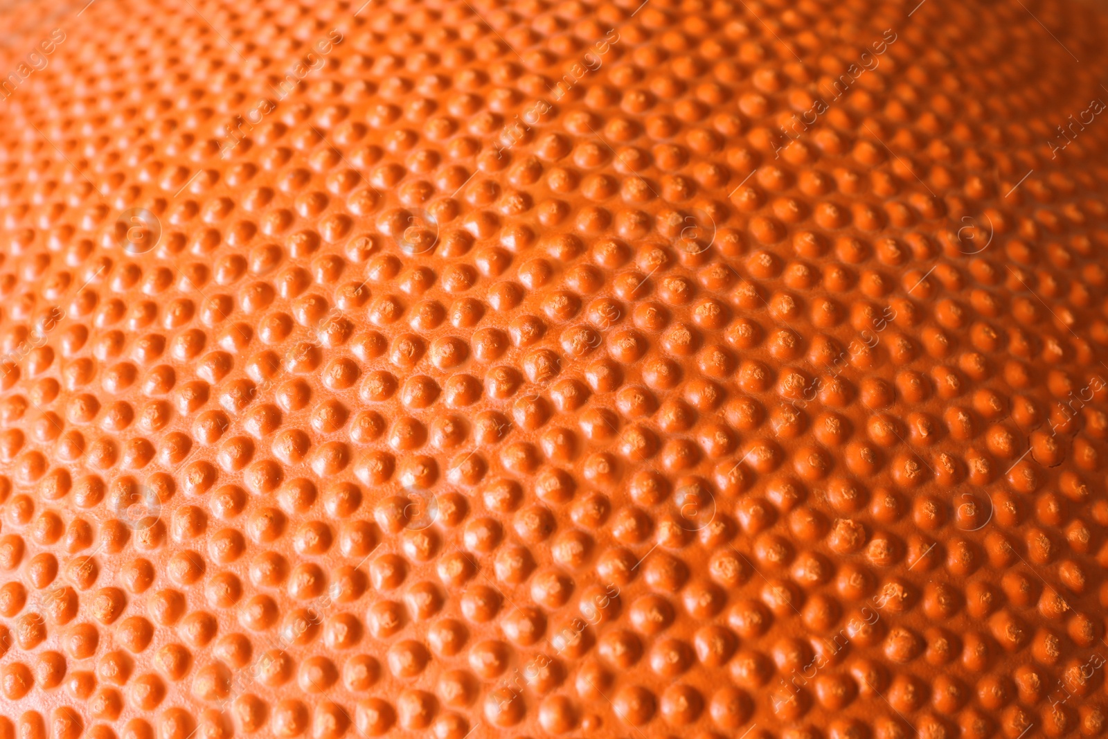 Photo of Orange textured surface as background, closeup view