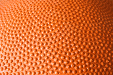 Photo of Orange textured surface as background, closeup view