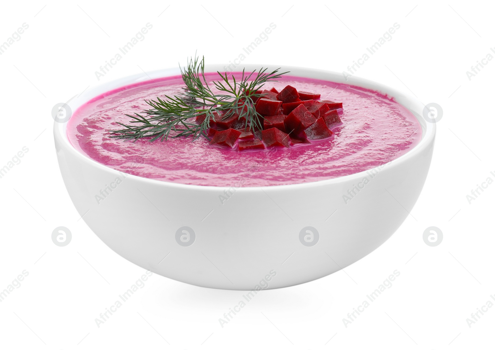 Photo of Delicious beetroot cream soup in bowl isolated on white