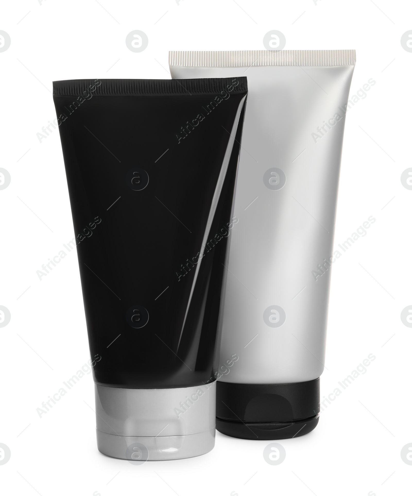 Photo of Tubes of men's facial creams on white background. Mockup for design