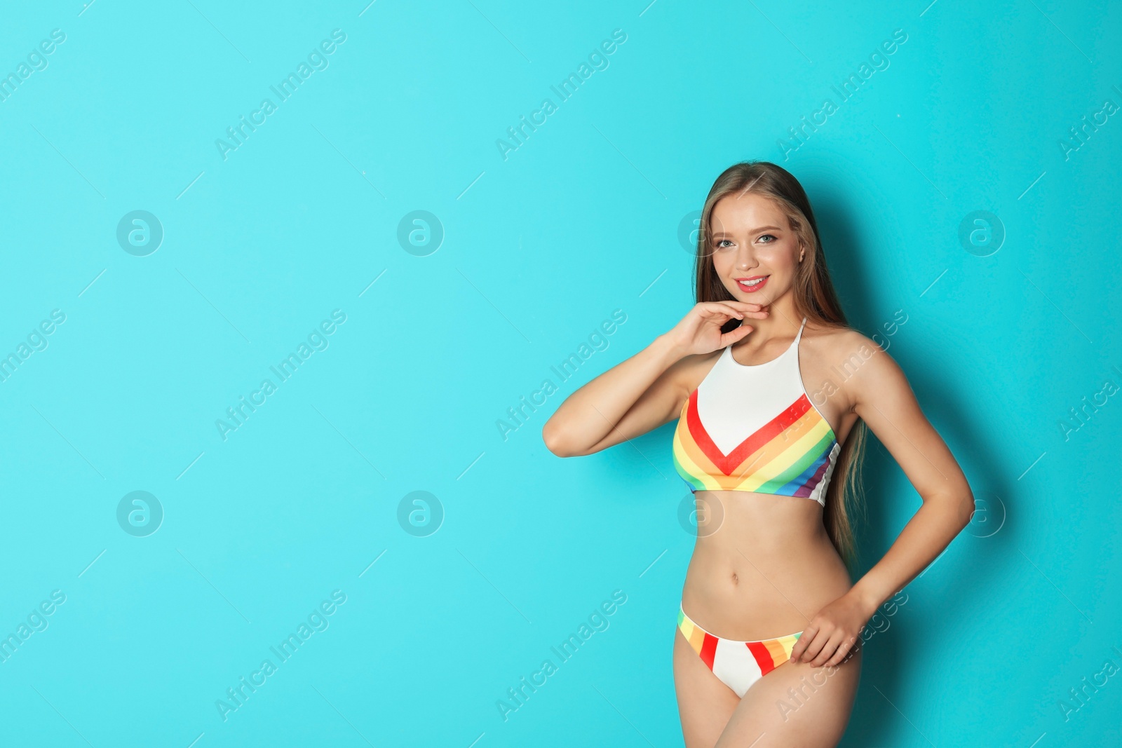 Photo of Beautiful woman wearing bikini on color background