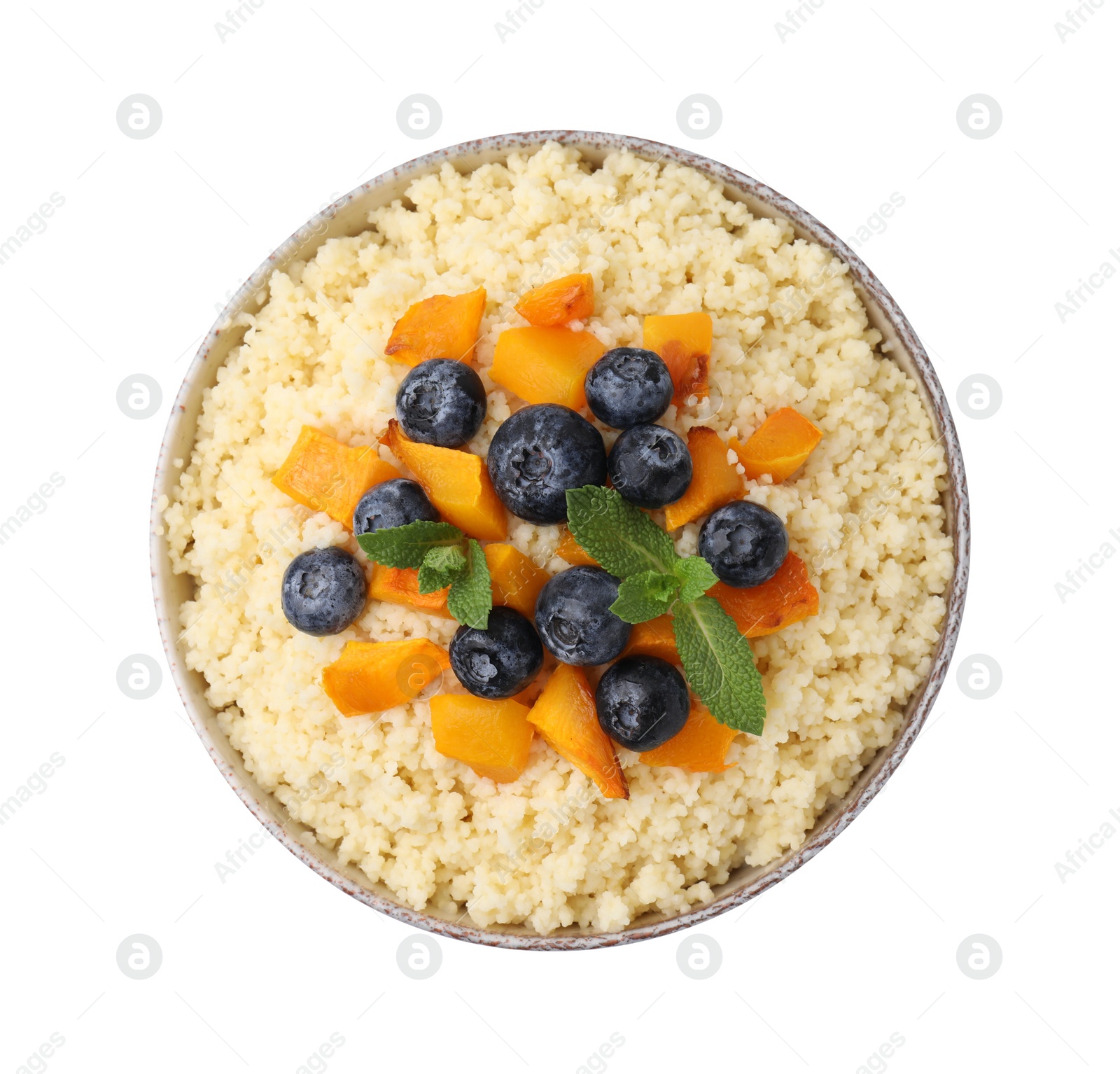 Photo of Bowl of tasty couscous with blueberries, pumpkin and mint isolated on white, top view