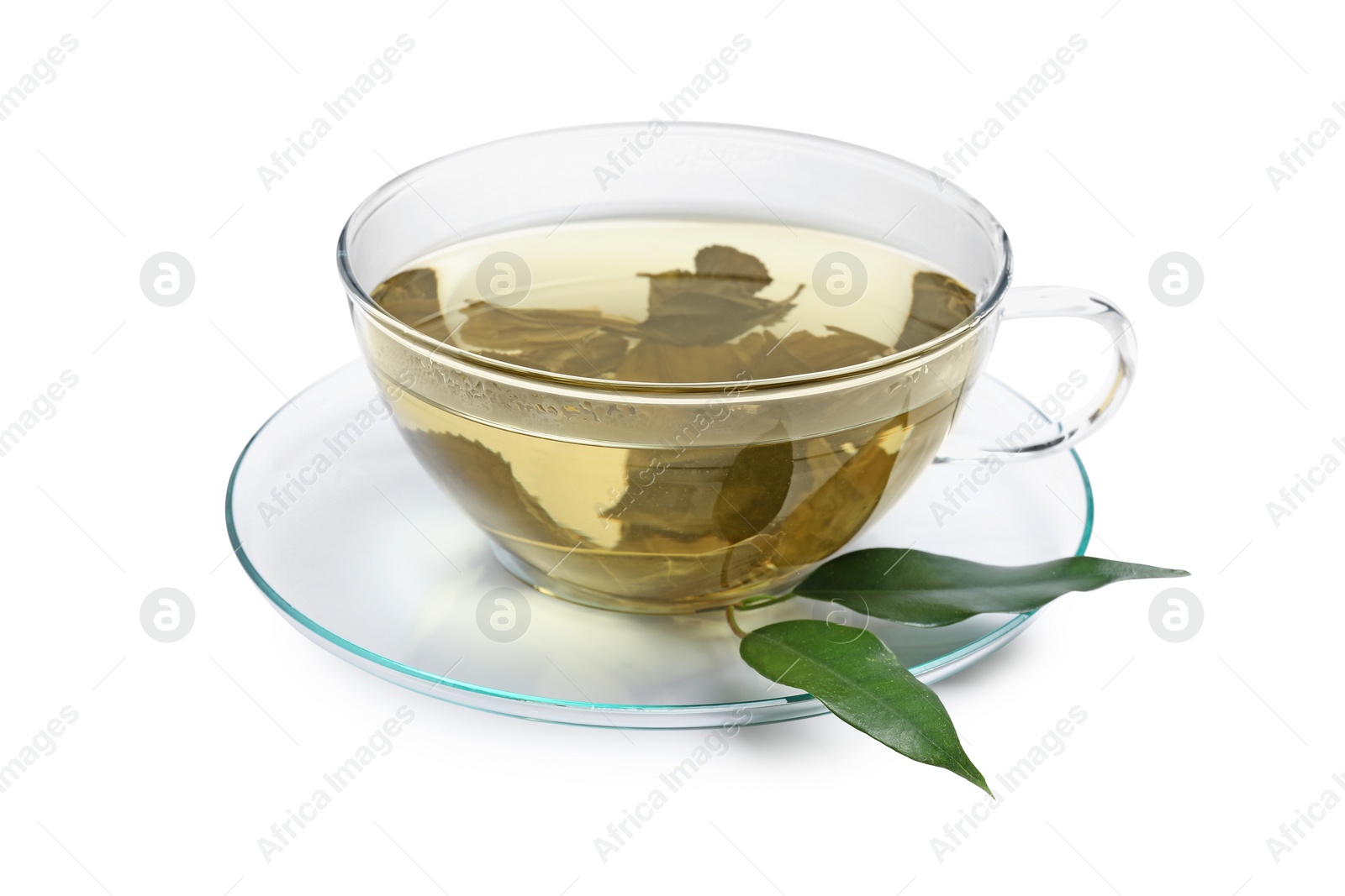 Photo of Refreshing green tea in cup and leaves isolated on white