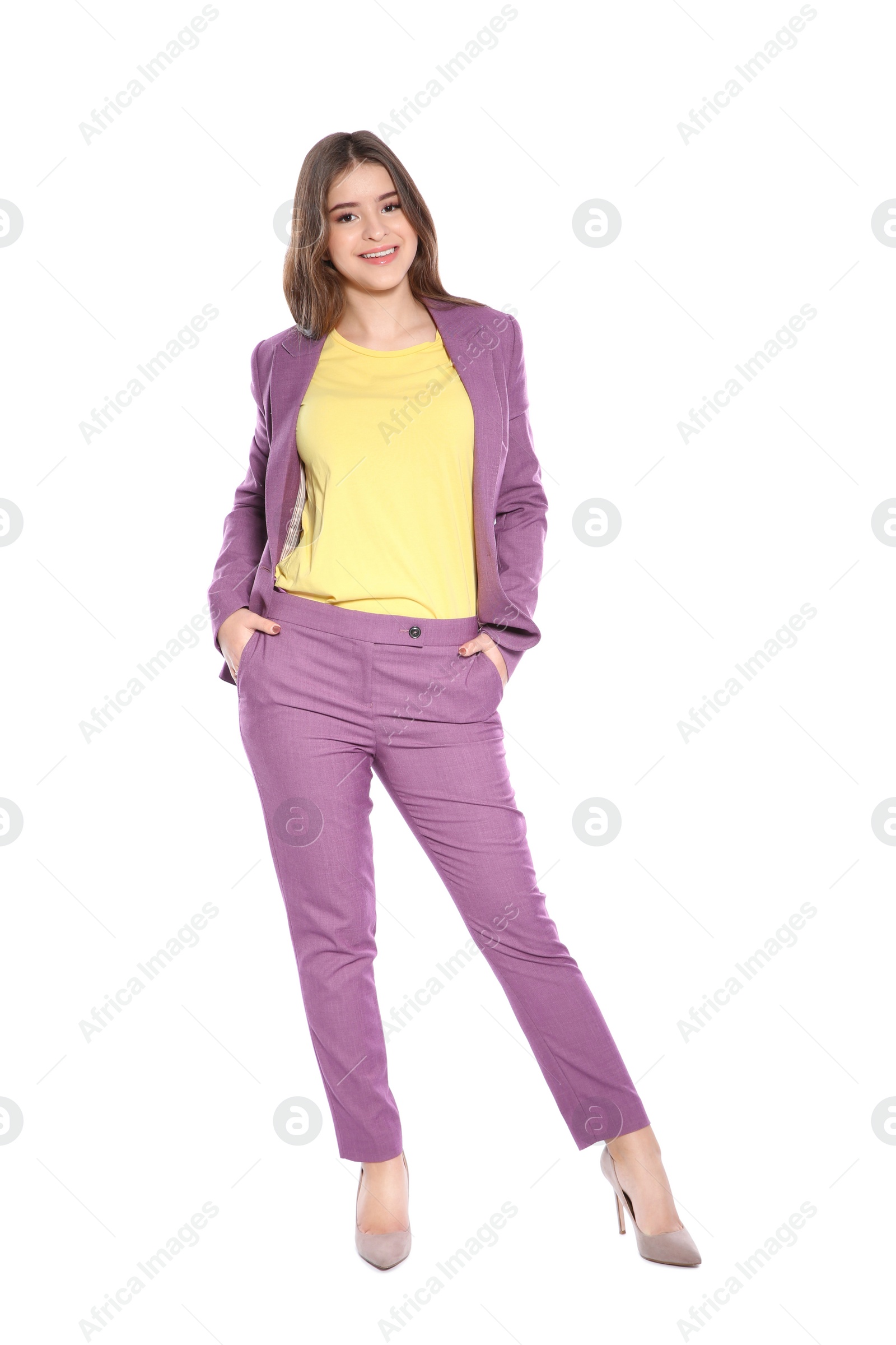 Photo of Attractive girl in stylish suit on white background