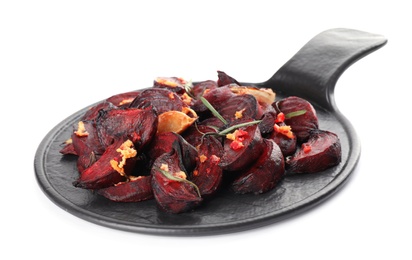 Photo of Slate plate with roasted beetroot slices, garlic and rosemary isolated on white