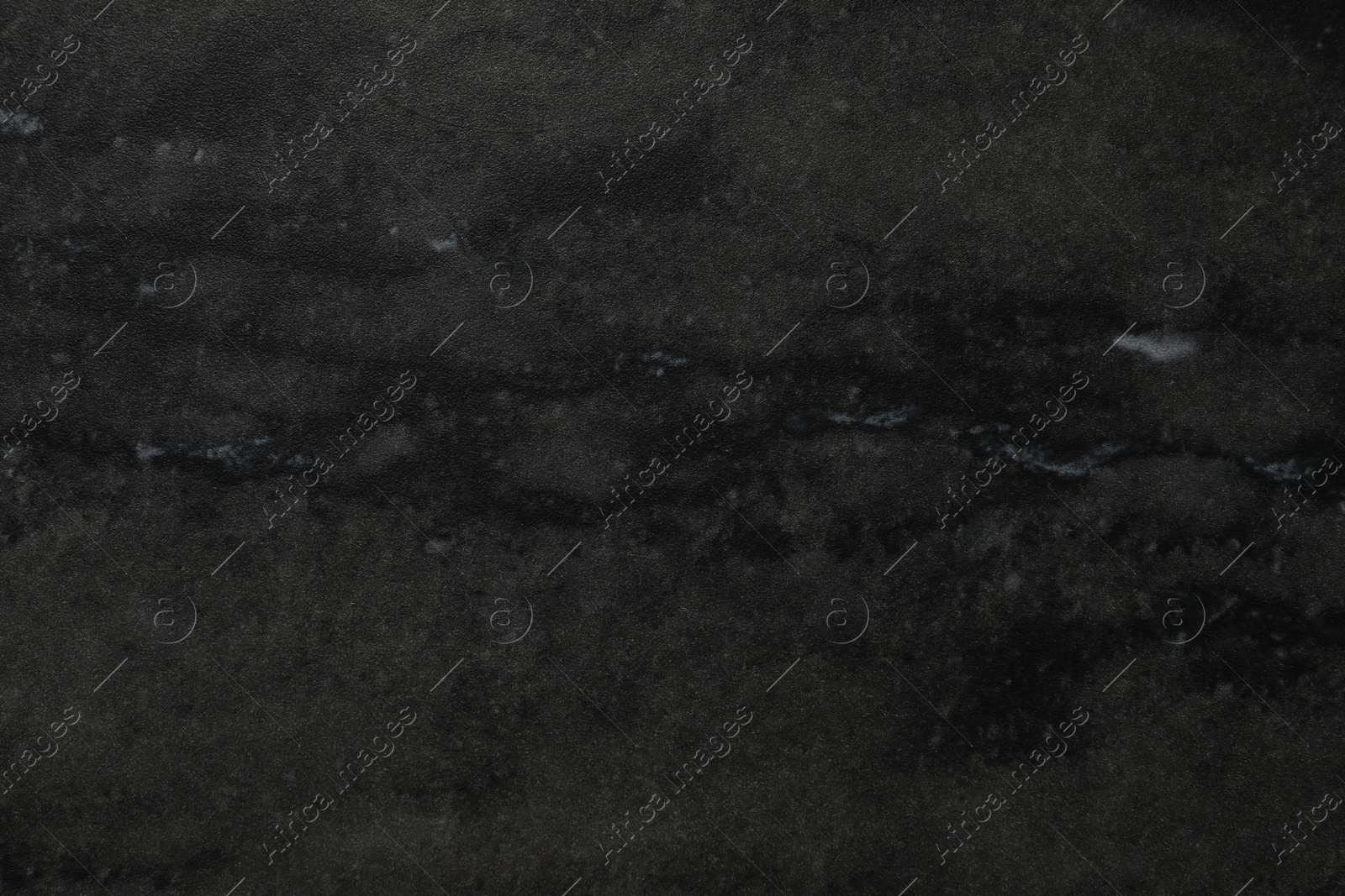 Photo of Black marble surface as background, closeup view