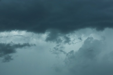 Sky with heavy rainy clouds on grey day