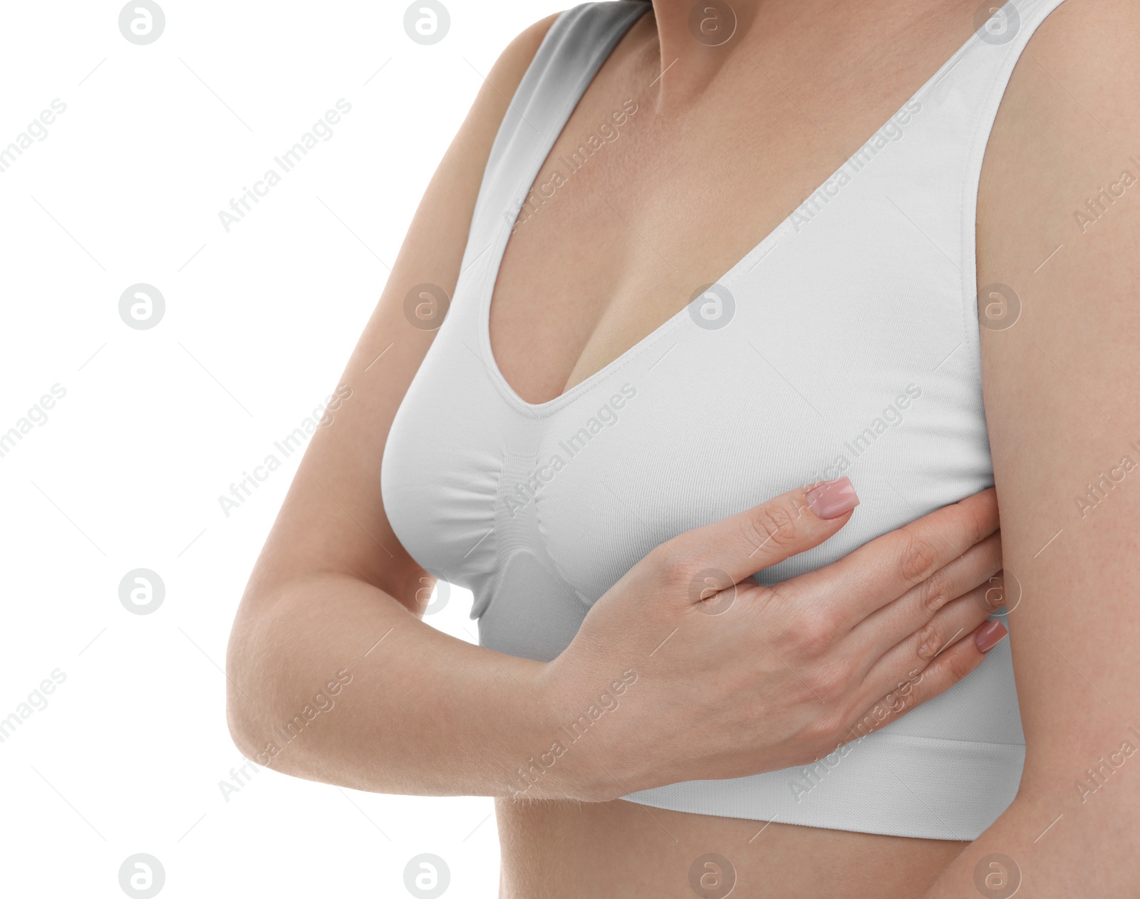 Photo of Mammology. Young woman doing breast self-examination on white background, closeup