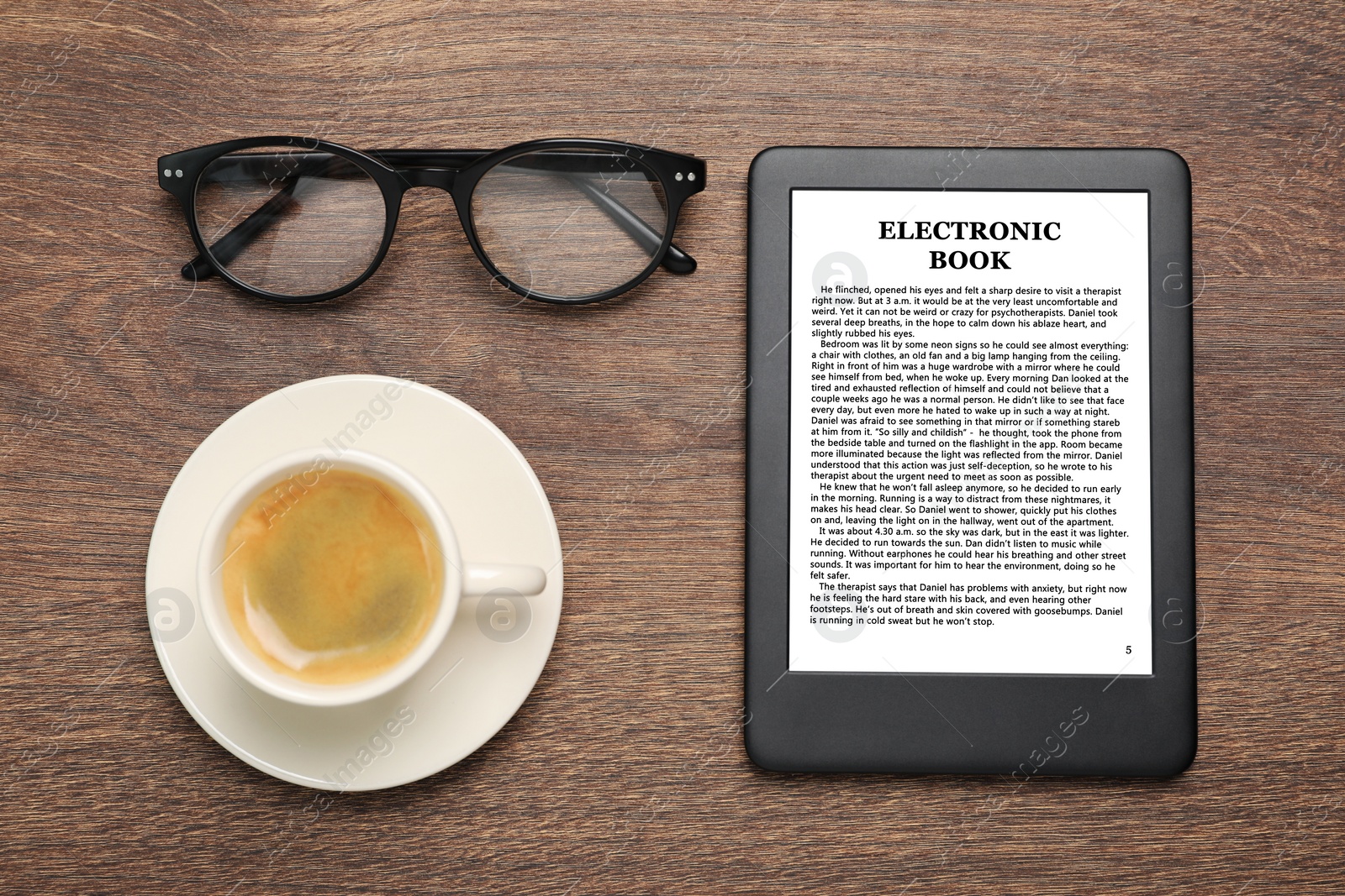 Image of Portable e-book reader, cup of coffee and glasses on wooden table, flat lay