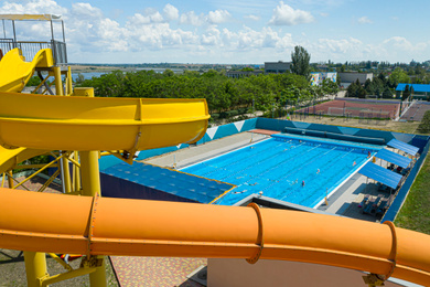 Image of Aerial view of water park on sunny day