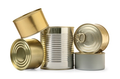 Photo of Closed tin cans isolated on white, mockup for design