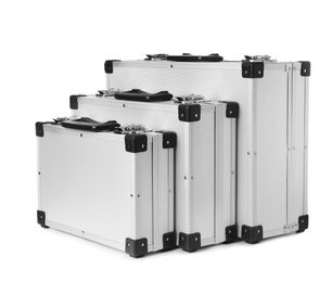 Photo of Set of aluminum hard cases on white background