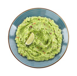 Photo of Delicious guacamole served with lime isolated on white, top view