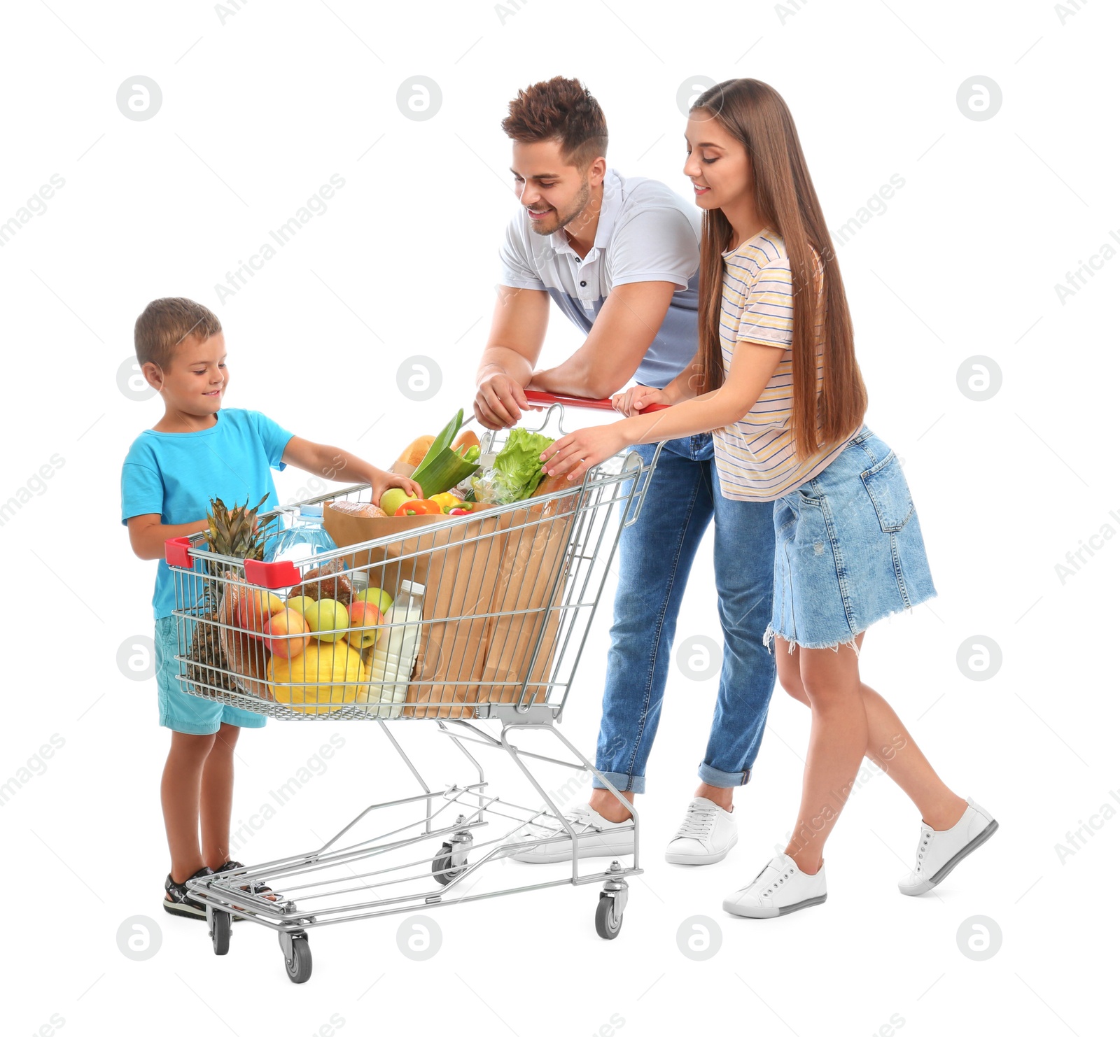 Photo of Happy family with full shopping cart on white background