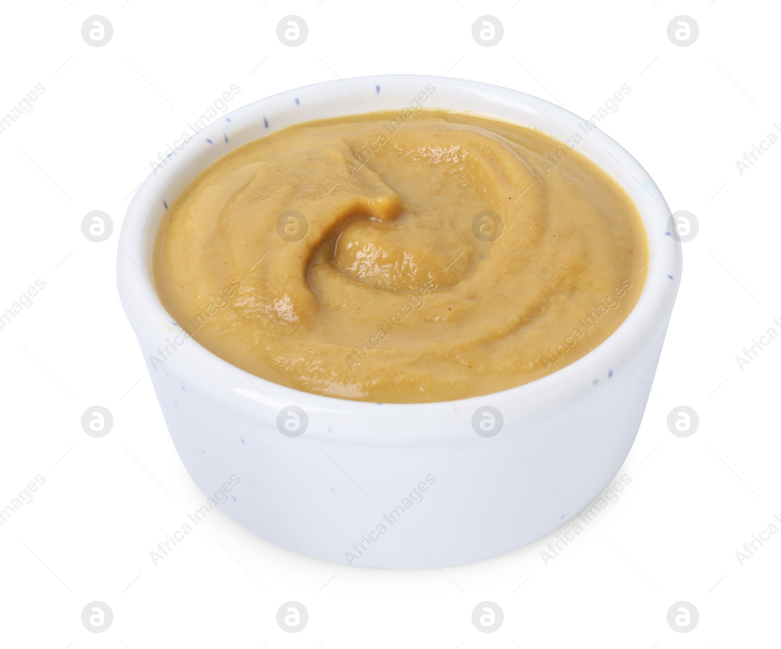 Photo of Fresh tasty mustard sauce in bowl isolated on white