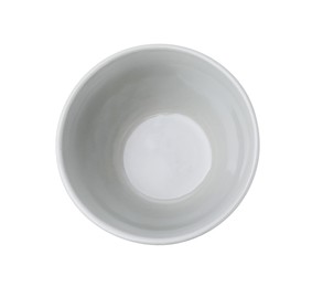 Photo of One ceramic bowl isolated on white, top view. Cooking utensils