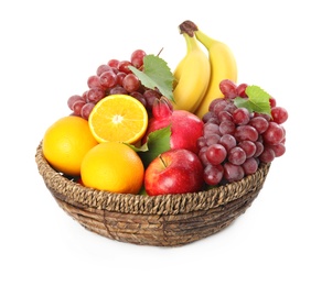 Photo of Wicker basket with different fruits on white background