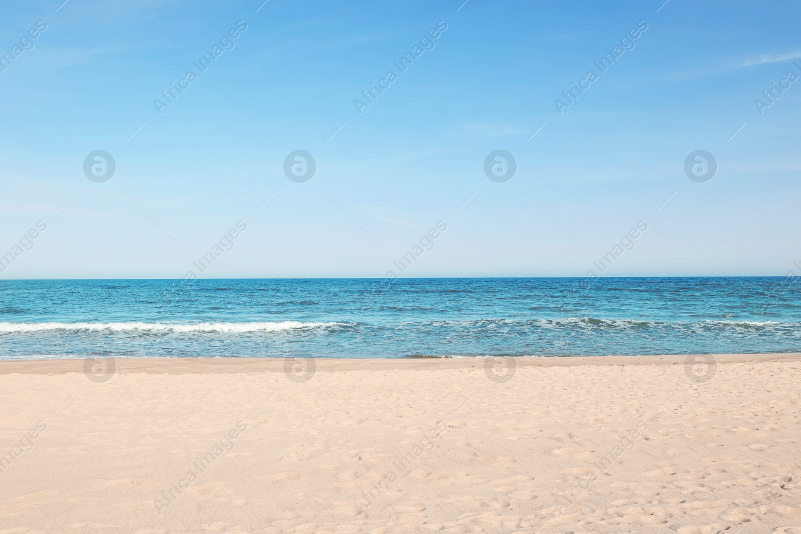 Photo of Picturesque view of beautiful sea and sandy beach on sunny day