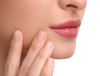 Photo of Young woman with beautiful full lips on white background, closeup