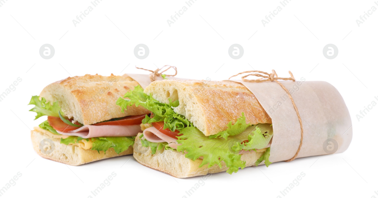 Photo of Tasty sandwiches with ham isolated on white