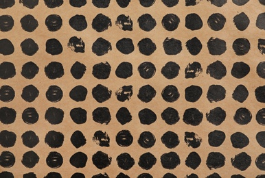 Photo of Color paper sheet with stylish pattern as background, top view