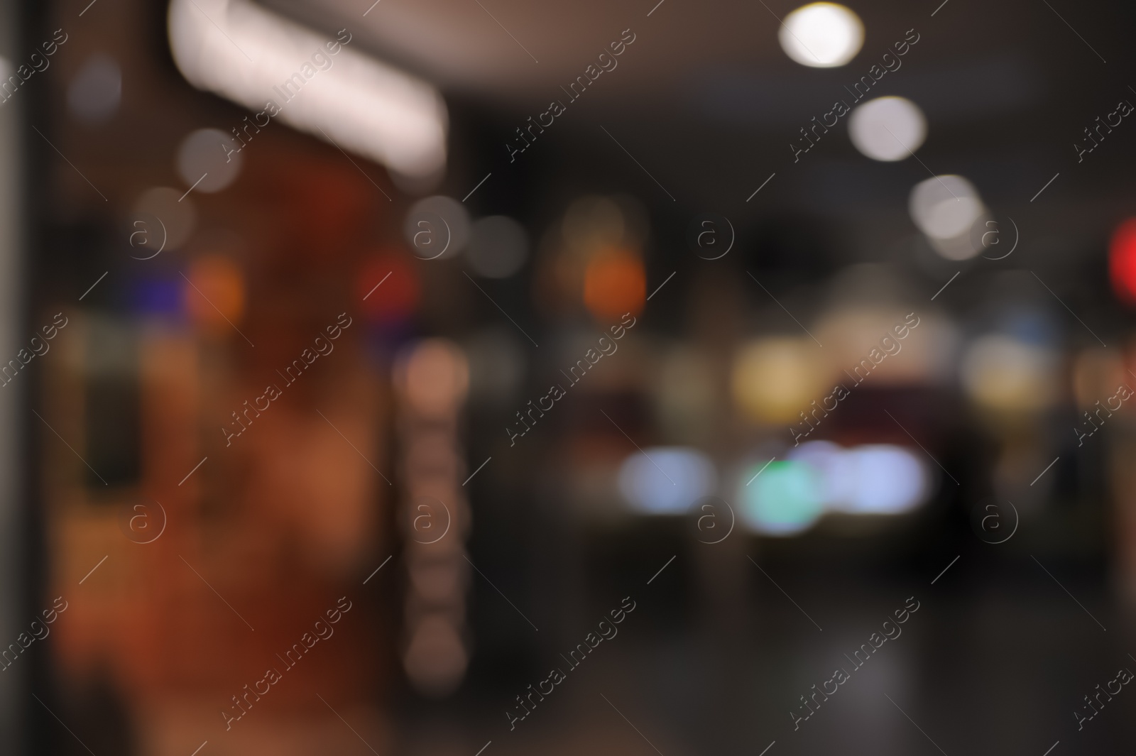 Photo of Blurred view of shopping mall interior. Bokeh effect