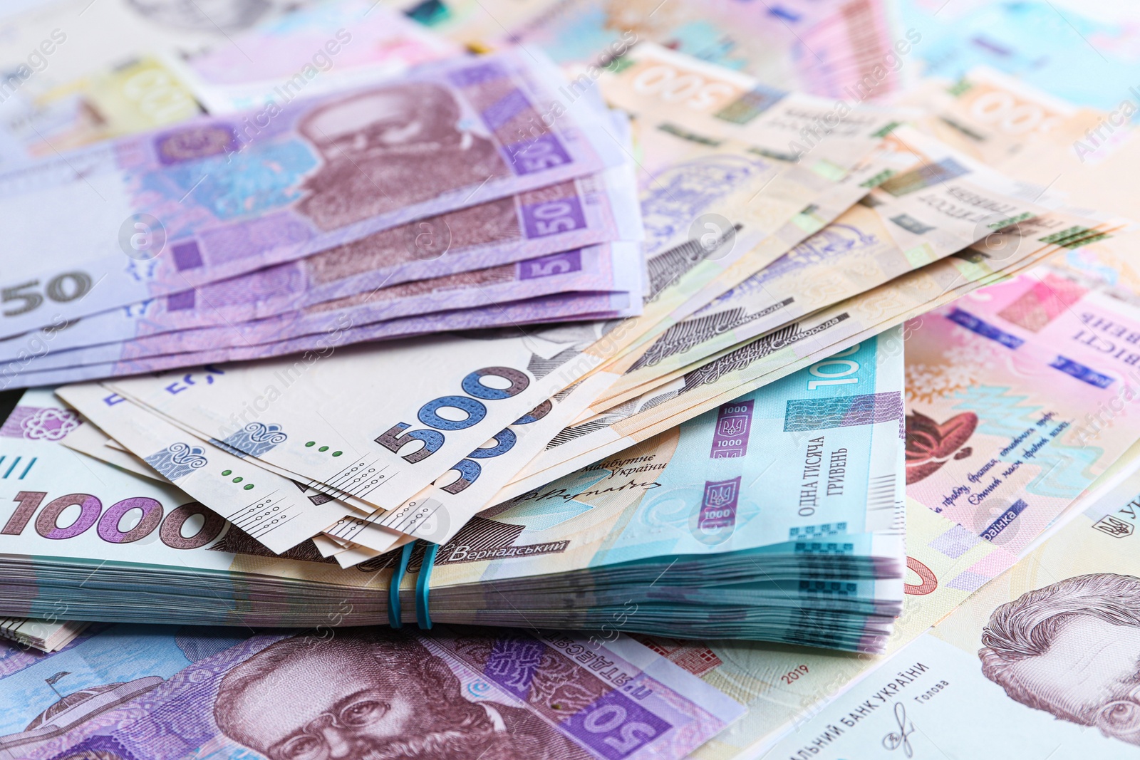 Photo of Closeup view of Ukrainian money as background. National currency