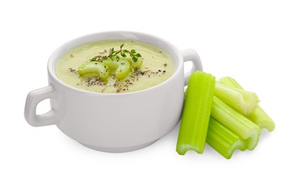 Photo of Bowl of delicious celery soup and fresh stalks on white background