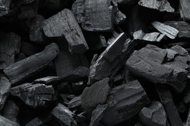 Photo of Heap of coal as background, closeup view
