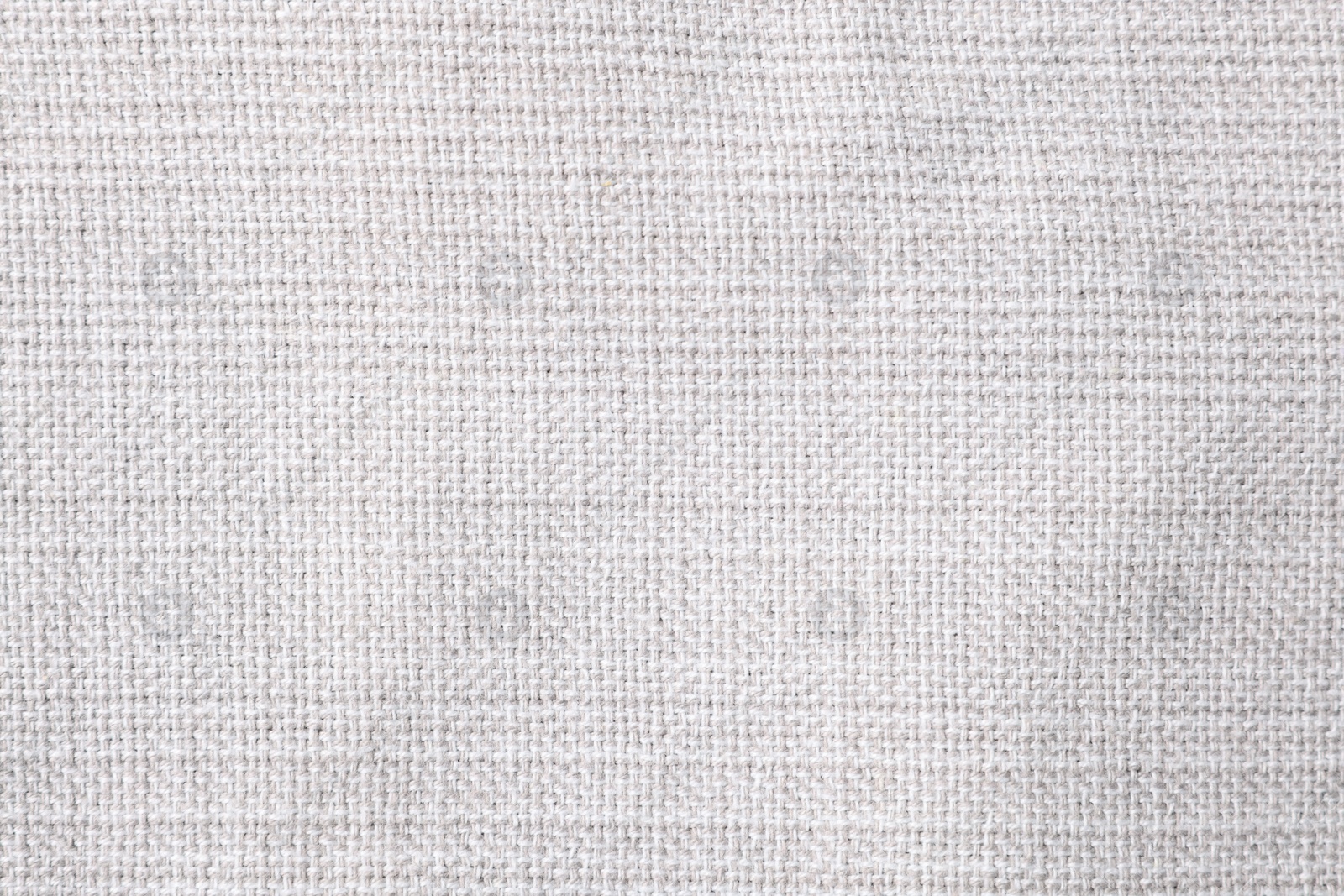 Photo of Texture of white fabric as background, top view