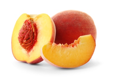 Fresh sweet peaches on white background