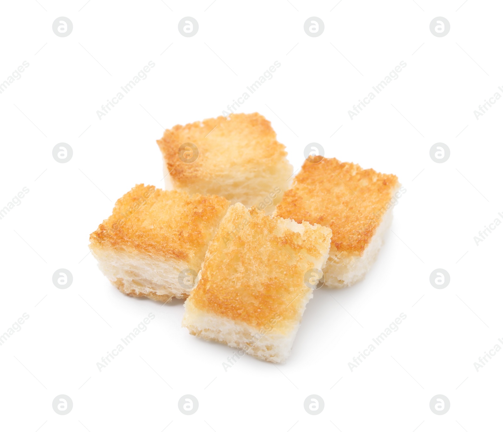 Photo of Pile of delicious crispy croutons on white background