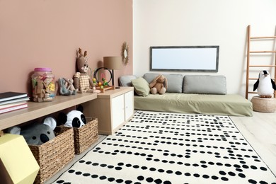 Montessori bedroom interior with floor bed and toys