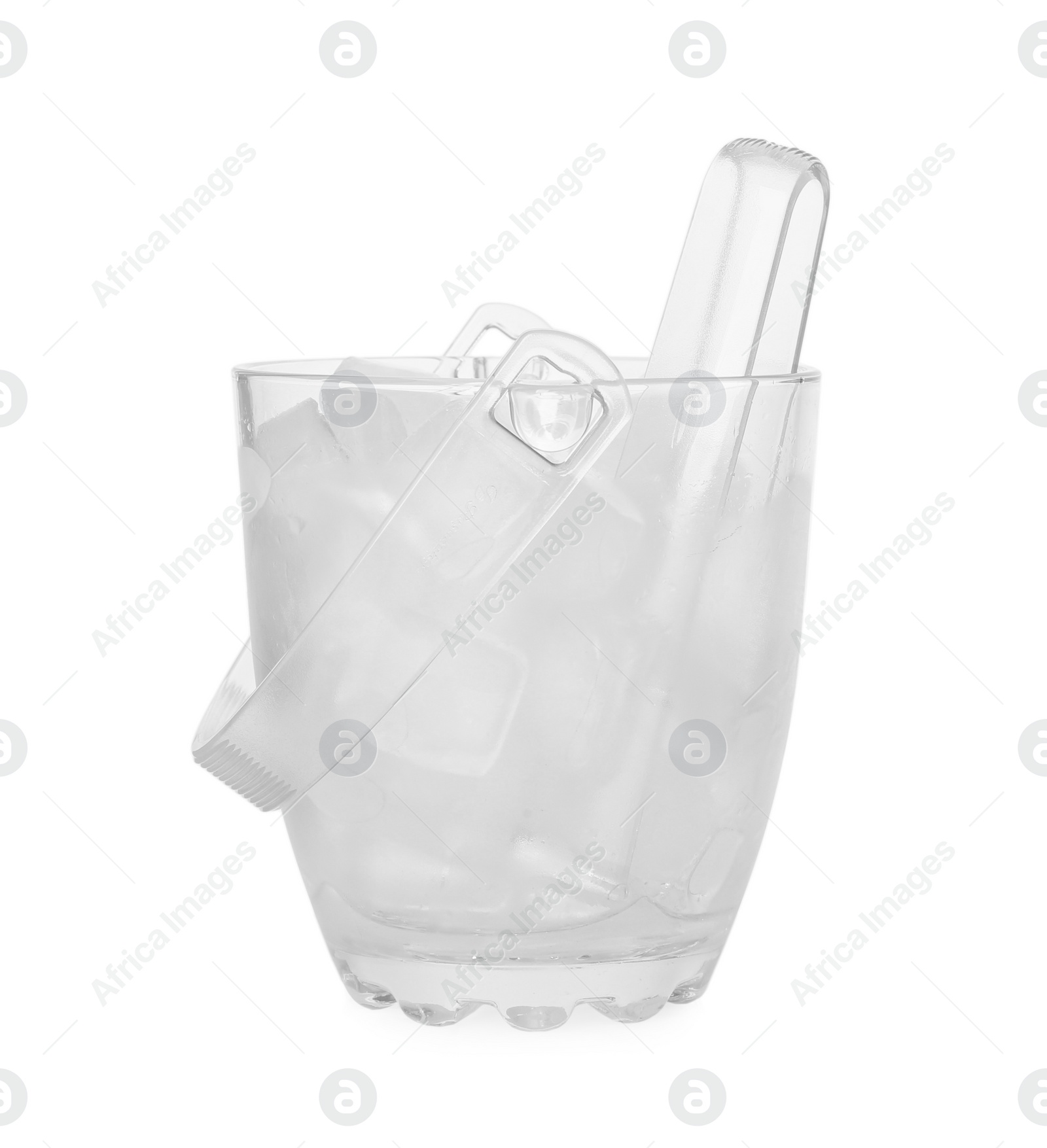 Photo of Glass bucket with ice cubes and tongs isolated on white