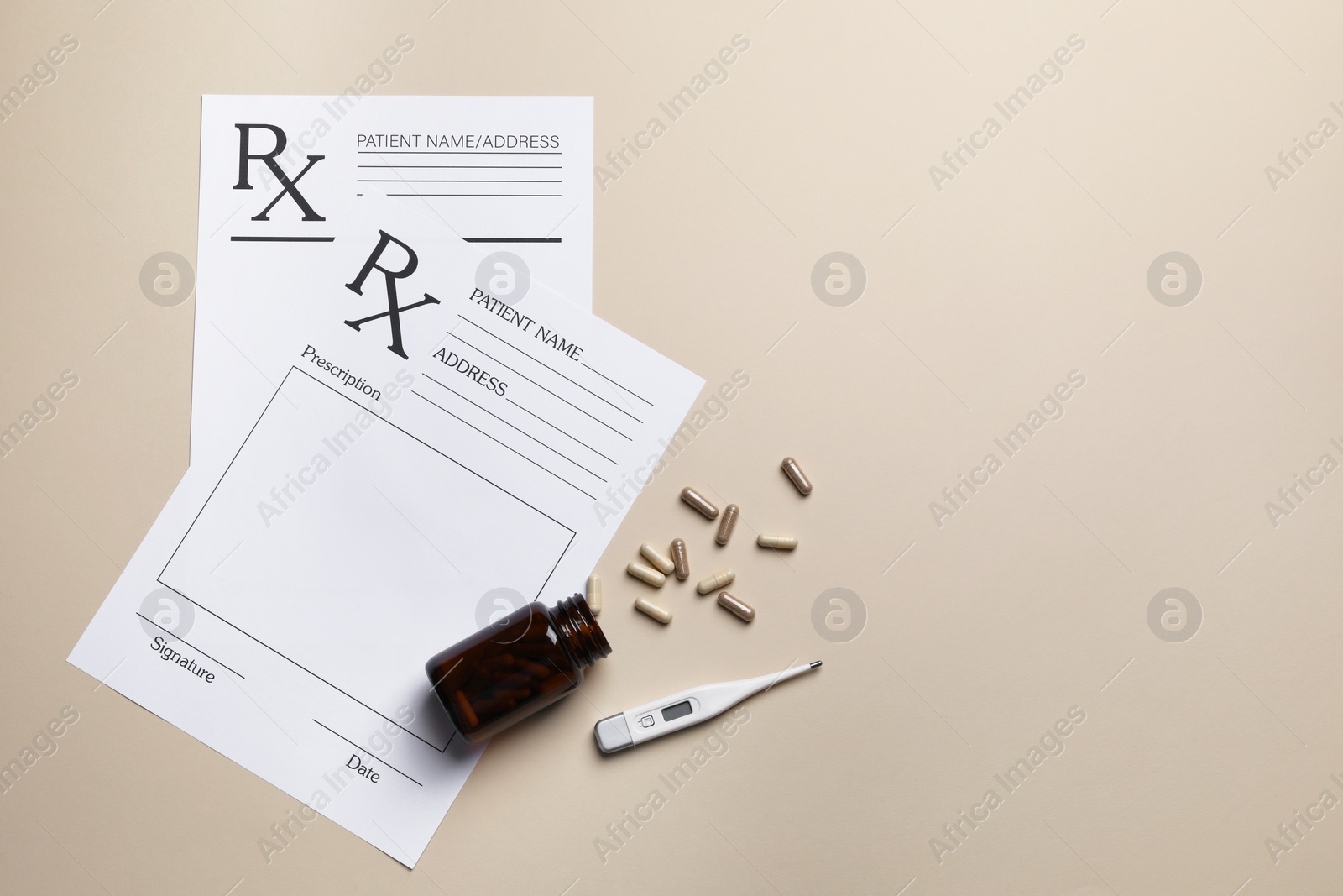 Photo of Medical prescription forms, pills and thermometer on beige background, flat lay. Space for text