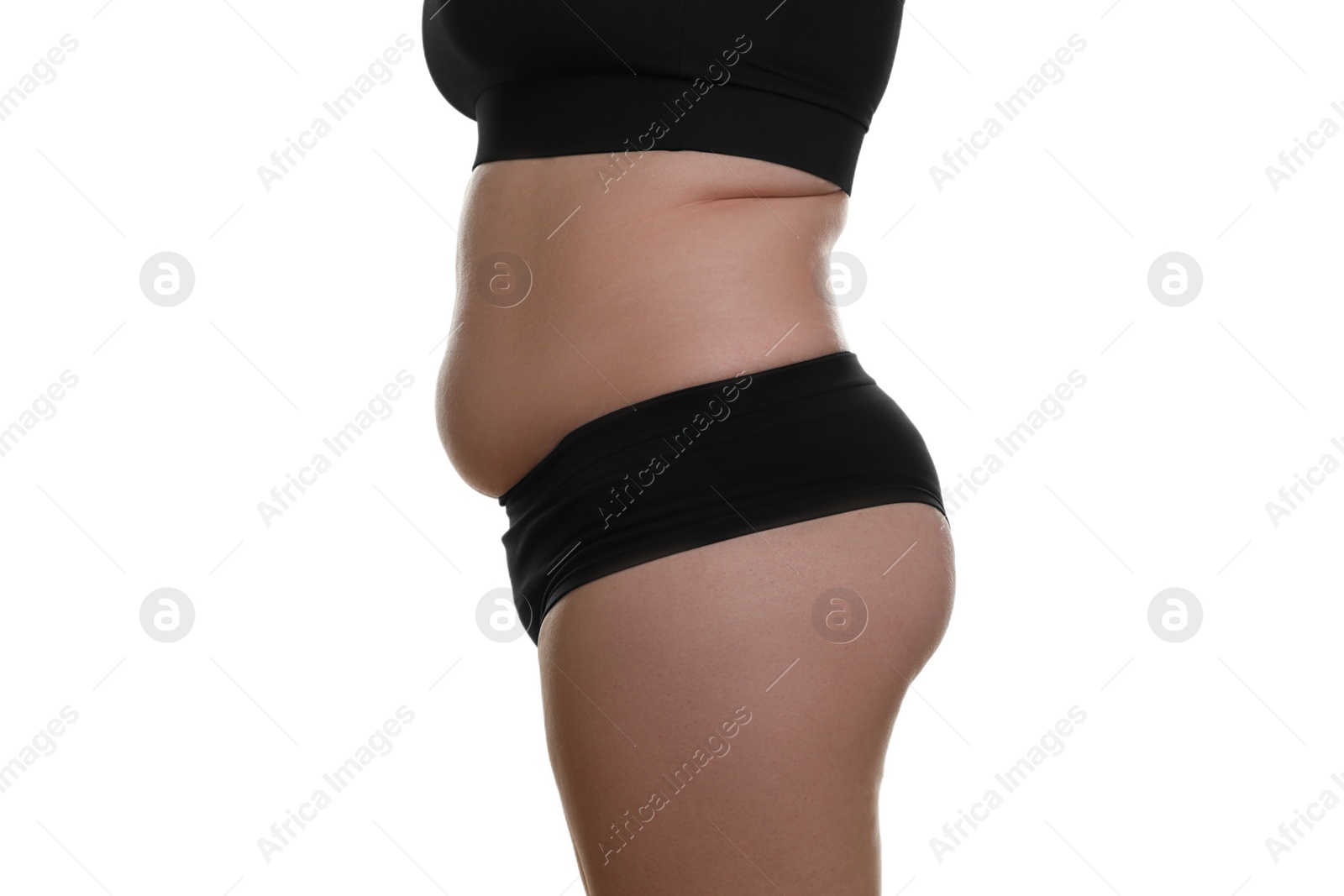 Photo of Woman with excessive belly fat on white background, closeup. Overweight problem