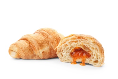 Photo of Tasty croissants with jam on white background