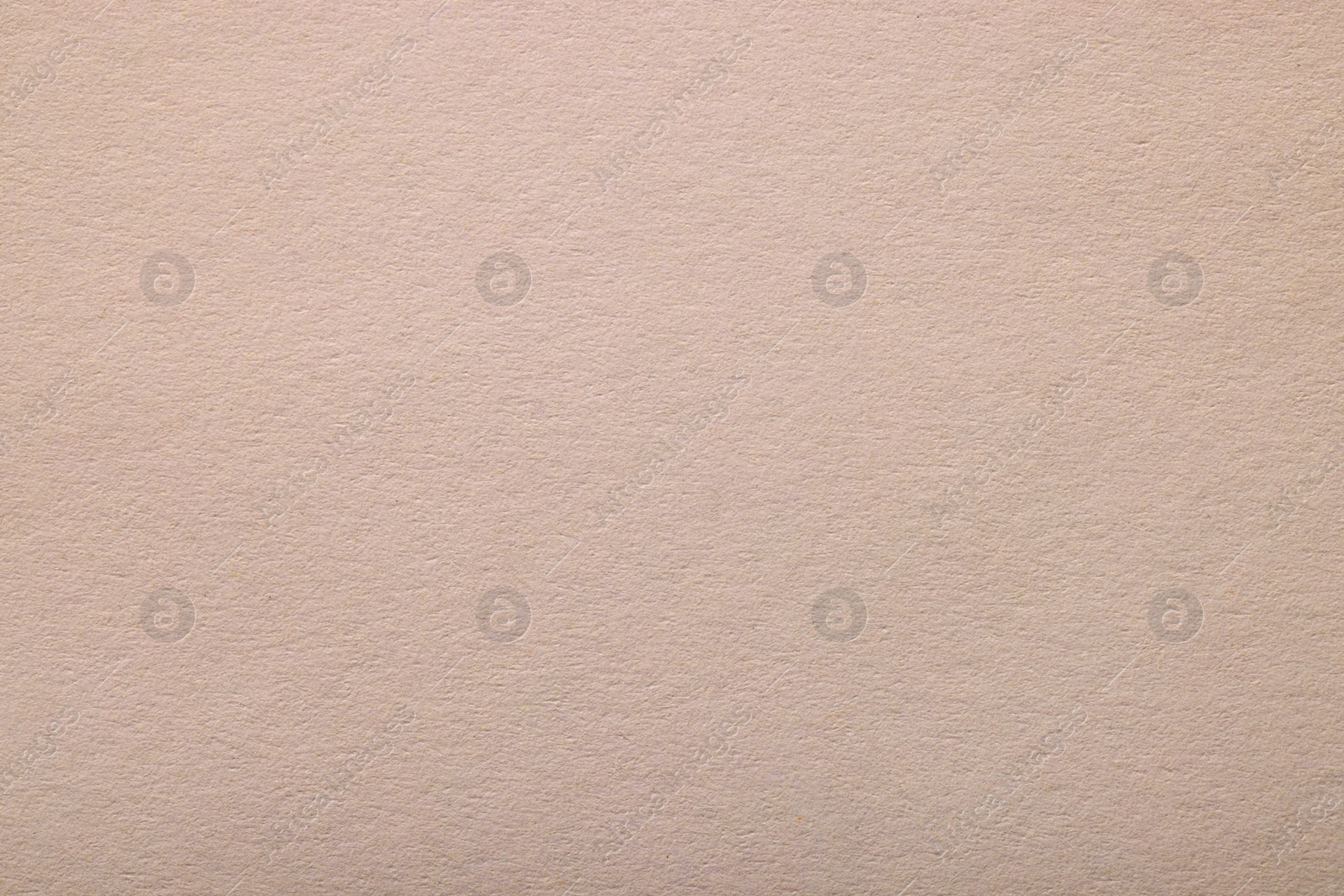 Photo of Texture of light grey paper sheet as background, top view